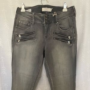 Torrid skinny Jegging size 12R. Grey denim with zippers.